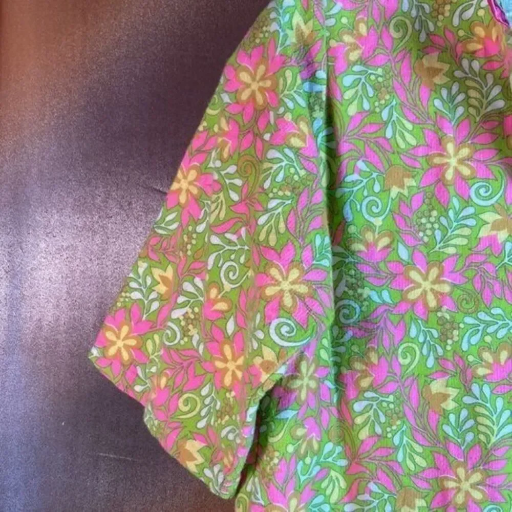 1970’s pink girls robe with short sleeve 30” length. 34” chest  120